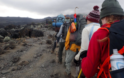 kili+trekkers+with+guide